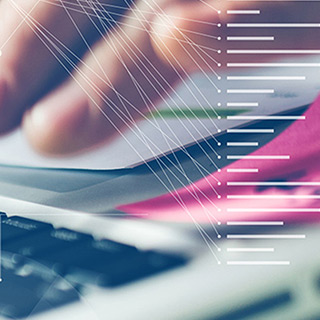 Fingers Positioned Over Laptop